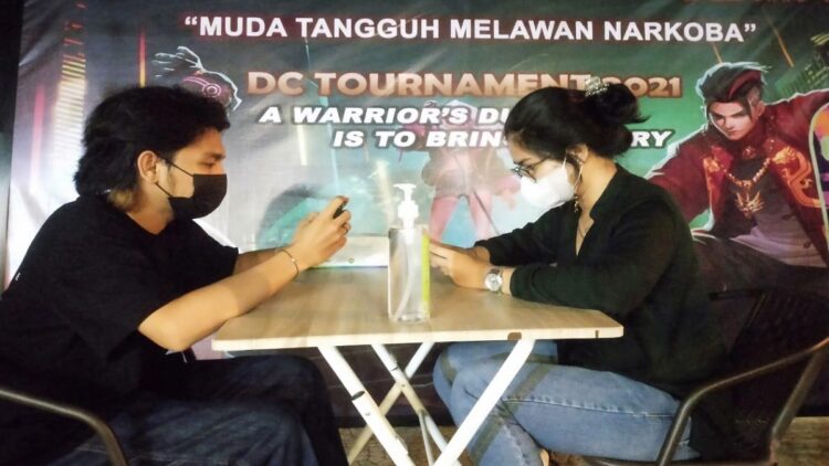 Ajak Milenial Lawan Narkoba, Komunitas Game di Padang Gelar Turnamen Mobile Legends 1 Turnamen mobile legends di Dua's Coffee, Padang.