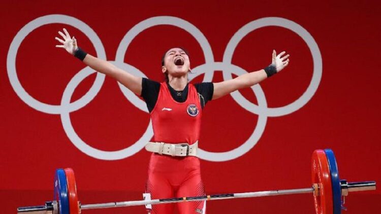 Lifter Indonesia, Windy Cantika Aisah yang memberi medali pertama untuk Indonesia di Olimpiade Tokyo 2020.