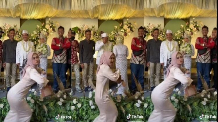 Wanita Berhijab Ini Joget "Liar" di Acara Nikah, Aksinya pun Viral 1 Wanita berhijab ini joget heboh di depan pelaminan. (TikTok/riweuhmom)