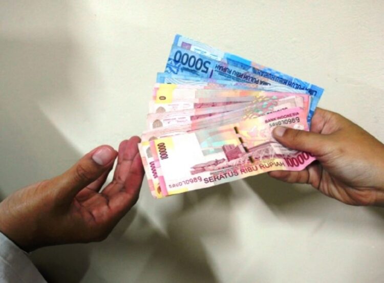 ilustrasi uang. (net)