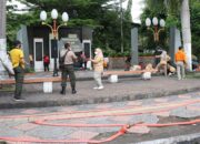 Penuh dengan Coretan, BPBD Padang Gelar Aksi Bersih-bersih di Tugu Gempa