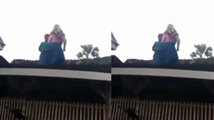 Wanita ini berjoget TikTok di atap rumah viral. (Instagram/andreli48)