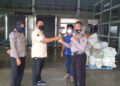 Terus Ingatkan Prokes, Polsek BIM Bagi-bagi Hand Sanitizer