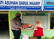 Polsek BIM Serahkan Puluhan Bansos di Kawasan BIM