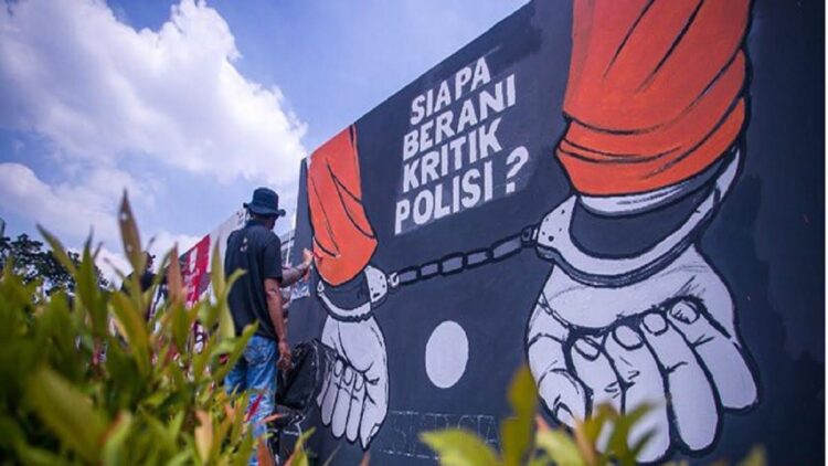 Minta Polri tak Reaktif terhadap Kritik Mural, Jokowi: Ada Mural aja Takut, Ngapain? 1 Ilustrasi mural kritik polisi. (net)