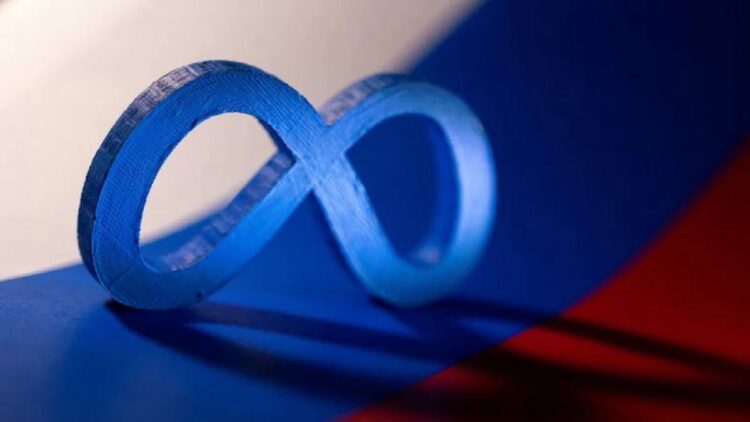 Ilustrasi, Logo Meta dengan Bendera Rusia, Sabtu (26/2/2022). (REUTERS/DADO RUVIC)