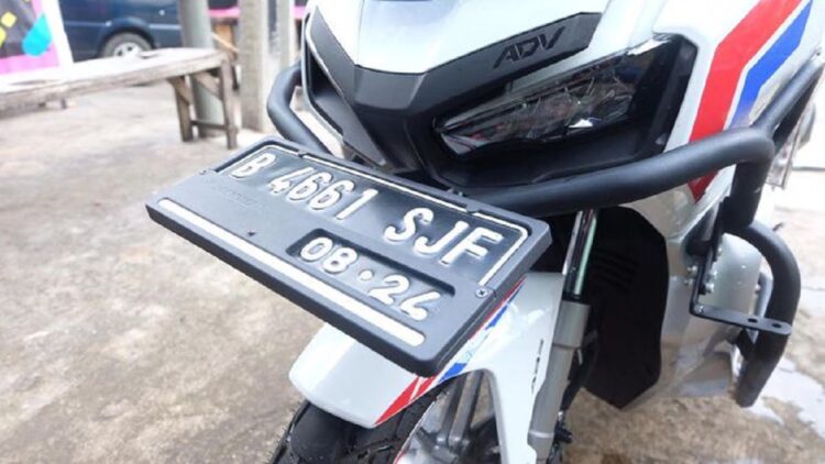 ilustrasi tiga huruf belakang plat nomor