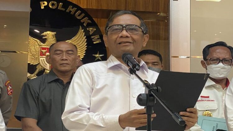 Menteri Koordinator Bidang Politik, Hukum, dan Keamanan (Menko Polhukam) Mahfud MD dalam konferensi pers di kantornya, Jakarta, Senin (19/9/2022).(KOMPAS.com/ACHMAD NASRUDIN YAHYA)