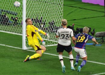 Takuma Asano mencetak gol kedua untuk Jepang dan menaklukkan Jerman di laga Grup E FIFA World Cup Qatar 2022. (Photo by Dean Mouhtaropoulos/Getty Images)