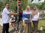 Andre Rosiade Bantu Mesin Potong Rumput dan Pompa Air untuk TMP Kuranji