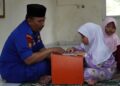 Personel Ditpolairud Polda Bali, Bripka Jono, mendirikan TPQ As Syifa, dan mengajarkan para santri baca Alquran secara gratis. (Foto: Dok. Istimewa)