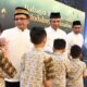 SIG dan Semen Padang berbagi dengan anak yatim. (Dok. Humas)