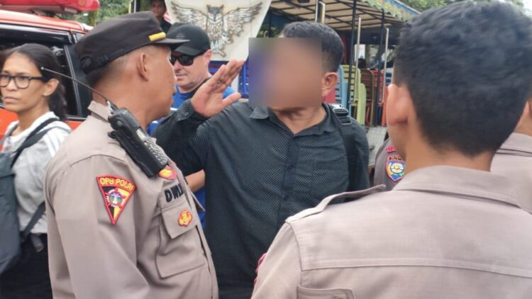 Diduga tak Tertib, Seorang Pria Diamankan Petugas di Festival Muaro Padang 1 pemuda diamankan