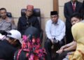 Wali Kota Padang Hendri Septa bersama Wakil Ketua Komisi I DPRD Sumatera Barat (Sumbar) dari Fraksi PAN Maigus Nasir menyambangi Polresta Padang pada Selasa (2/5/2023). (Dok. Istimewa)
