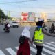 Aksi personel Polwan Polda Sumbar di jalanan Kota Padang dalam rangka peringatan HUT ke-75. (dok. Bidhumas)