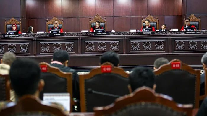 Gugatan Mahasiswa UNS terkait Batas Usia Capres Cawapres Dikabulkan, Gibran Boleh Maju Pilpres 2024 1 Ilustrasi sidang di Mahkamah Konsitutusi. (Foto: Dok. Jawapos.com)