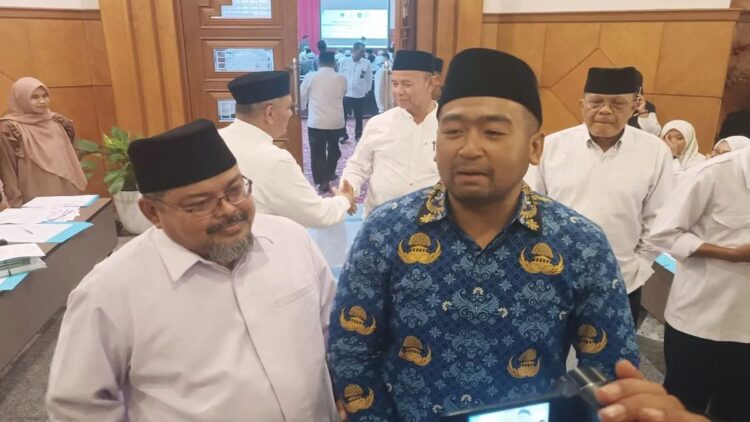 Belum Terkelola Maksimal, Potensi Zakat di Sumbar Capai Rp4,3 Triliun per Tahun 1 Ketua Baznas Sumbar Bukhari bersama Wagub Sumbar Audy Joinaldy. (ANTARA/Miko Elfisha)