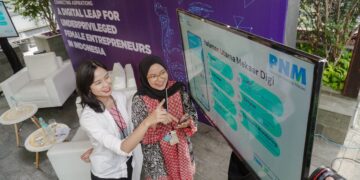 Kolaborasi Telkomsel dengan PNM Mekaar. (dok. Telkomsel)