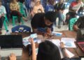 Besok! Ribuan Peserta Diprediksi Hadir dalam Teluk Bayur Berlari 7 Suasana registrasi ulang dan pembagian jersey dan nomor BIB di Sekretariat Amril Amin, Jalan Cempaka No.1, Mata Air, Kecamatan Padang Selatan. (dok. istimewa)