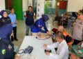 Biddokkes Polda Sumbar beri layanan pengobatan gratis untuk PPK. (dok. istimewa)
