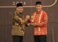 Wakil Menteri Ketenagakerjaan (Wamenaker), Afriansyah Noor (kiri) dan Gubernur Sumbar, Mahyeldi. (Foto: Dok. Adpim)
