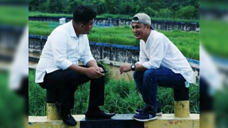 Muhammad Samin saat bersama dengan Bupati Dharmasraya Sutan Riska pada suatu kesempatan. (Foto: Dok. Pribadi)
