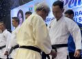 Ketua Forki Dharmasraya, Junaindra Sumawan resmi menyandang sabuk hitam. (Foto: Dok. Pribadi)