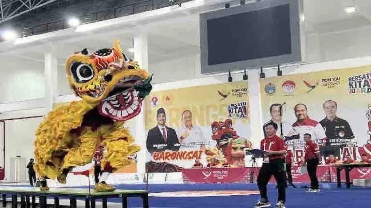 Tim Sumbar Nomor Barongsai Kecepatan Kena Diskualifikasi di PON XXI 1 Penampilan cabang olahraga barongsai nomor Barongsai Kecepatan di Martial Arts Arena, Kompleks Sumut Sport Center, Deli Serdang, Sumatera Utara, Minggu (8/9/2024). ANTARA/Harianto