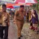 Pj Wali Kota Padang melihat tradisi malamang di Limau Manis Selatan. (dok. infopublik)