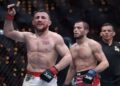 Merab Dvalishvili selebrasi usai kalahkan Umar Nurmagomedov dalam laga UFC 311. (dok. AFP)