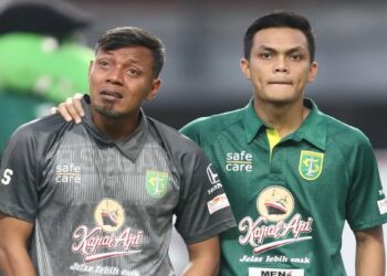 Bejo Sugiantoro dan anaknya Rachmat Irianto. (dok. Jawapos)