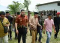 Wako Fadly Amran Tinjau Kawasan Rawan Genangan di Tunggul Hitam 2 Wako Fadly Amran cek kondisi wilayah terdampak genangan di Tunggul Hitam. (dok. Prokopim)