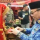 Wawako Maigus Nasir buka iven Koto Tangah Baralek Gadang diawali dengan mangutia siriah. (dok. Prokopim)