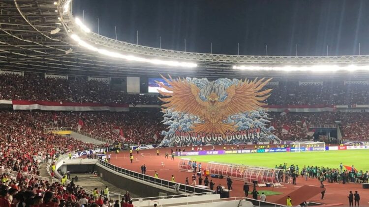 Tifo Spesial Siap Sambut China, Suporter Timnas Janji lebih Meriah dari Laga Bahrain 1 Kelompok suporter timnas Indonesia La Grande Indonesia memamerkan koreografi spektakuler pada pertandingan melawan Bahrain di Stadion Utama Gelora Bung Karno (SUGBK), Jakarta, Selasa (25/3/2025) malam. (ANTARA/Zaro Ezza Syachniar)