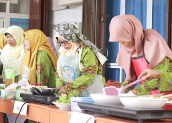 Milad Panti Asuhan Aisyiyah ke-108 dimeriahkan oleh lomba masak pakai kompor induksi. (dok. Humas PLN)