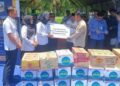 BRI Peduli serahkan bantuan korban banjir di Dharmasraya. (dok. istimewa)