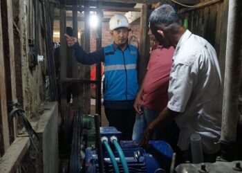 Penerapan transisi energi dengan benchmarking huller listrik di Solok. (dok. Humas)