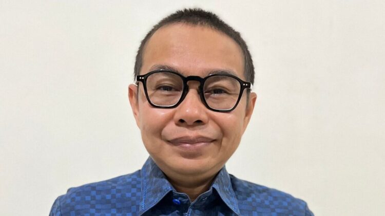 Ketua KI Sumbar Musfi Yendra