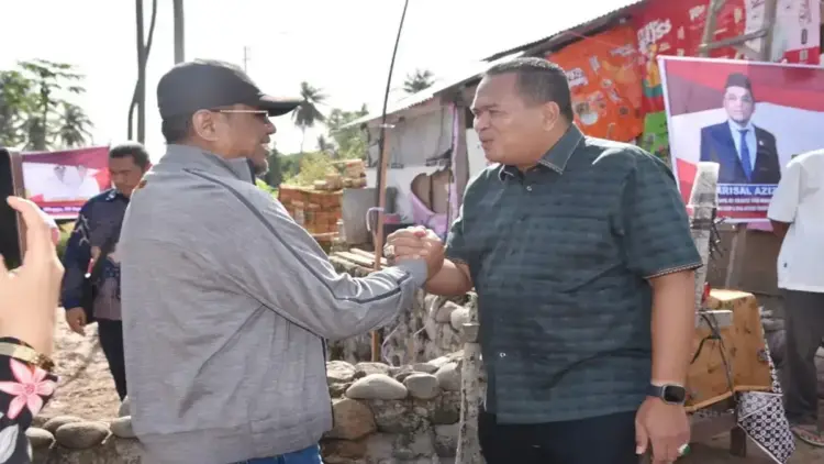 Wako Pariaman Dampingi Arizal Azis Bangun RTLH di Kelurahan Karan Aur 1 Wako Pariaman Yota Balad bertemu anggota DPR Arizal Azis. (Foto: Ist)