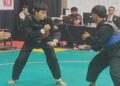 Atlet Pencak Silat dari Sumbar sedang bertanding di hari pertama laga cabor Pencak Silat PON Beladiri 2025. (dok. istimewa)