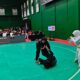 Pesilat putri Sumbar Paula Listi di Kelas C Putri membanting pesilat Maluku, Eka P. Dewi Polpoke. Paula menang mutlak atas40–10. (Foto Humas KONI Sumbar)