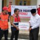 Semen Padang serahkan bantuan kepada Pemprov Sumbar untuk penanganan bencana. (dok. Humas)