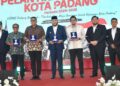 Wali Kota Padang Fadly Amran menghadiri pelantikan Badan Pengurus Cabang (BPC) Himpunan Pengusaha Muda Indonesia (HIPMI) Kota Padang Periode 2025–2028, yang digelar di Grand Basko Hotel Padang, Senin (10/11/2025).. (dok. Prokopim)