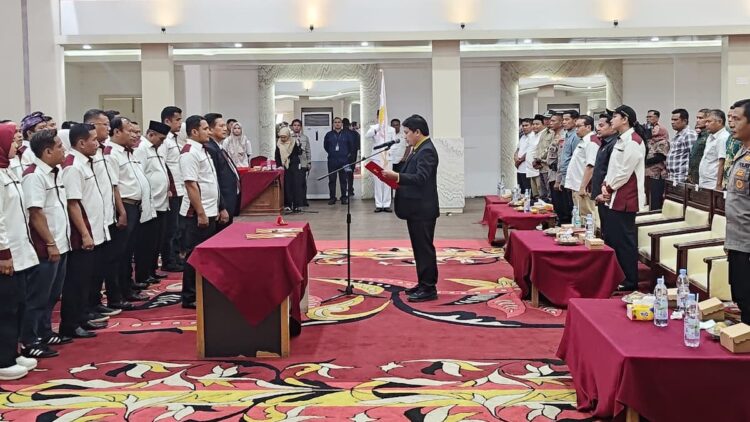 Pelantikan pengurus KONI Dharmasraya. (dok. Humas KONI)