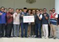 Bantuan 10 ribu sak semen untuk penanganan pascabencana yang diserahkan ke Pemprov Sumbar. (dok. istimewa)